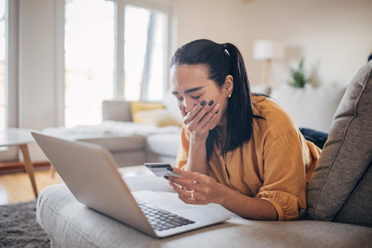 A stressed landlord surrounded by paperwork and a phone ringing off the hook